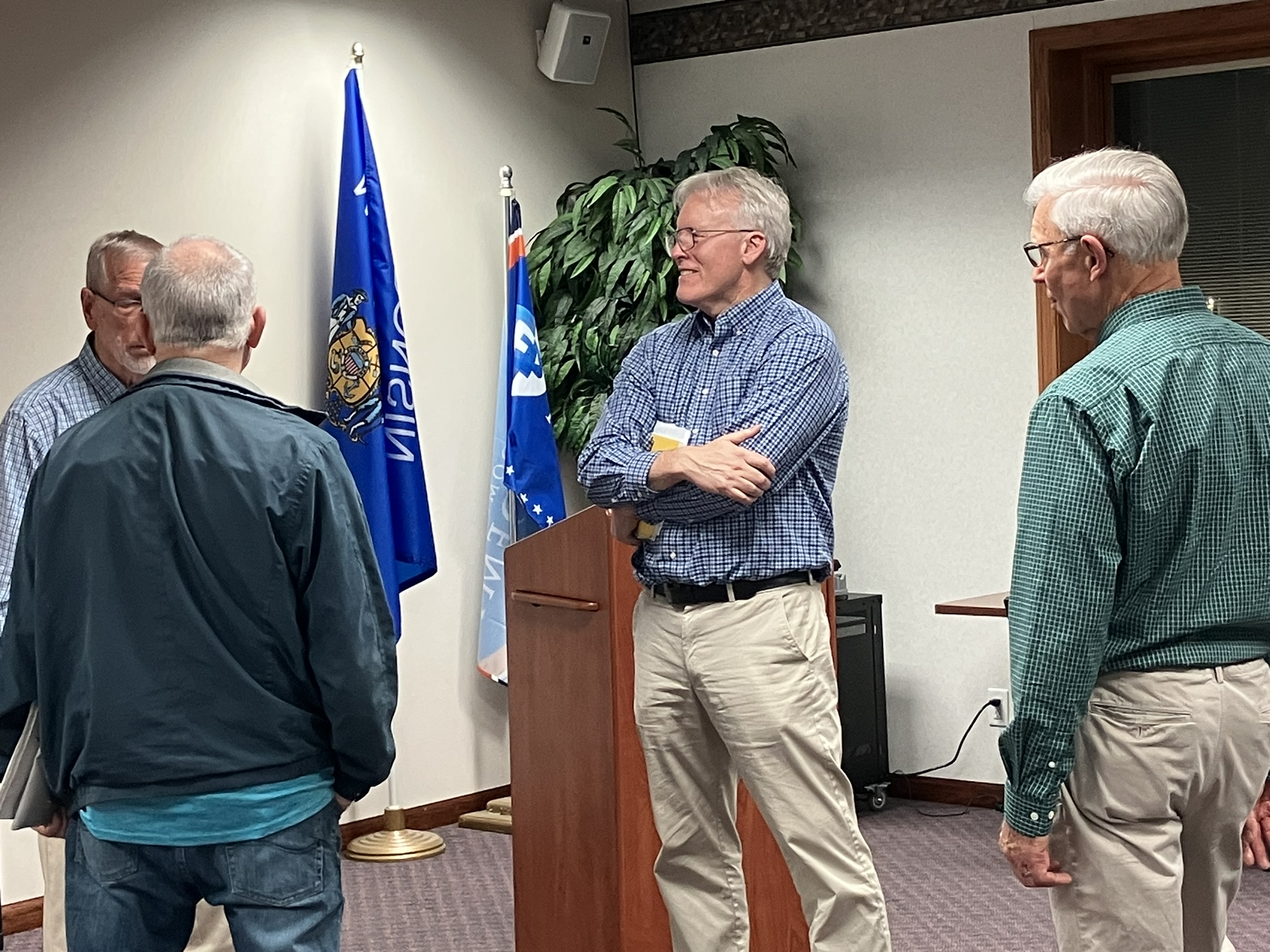 John Pudner, president of Take Back Our Republic Action Fund, chatted with guests after the November 6, 2023 meeting of Fox Valley Initiative in Appleton, Wisconsin.
