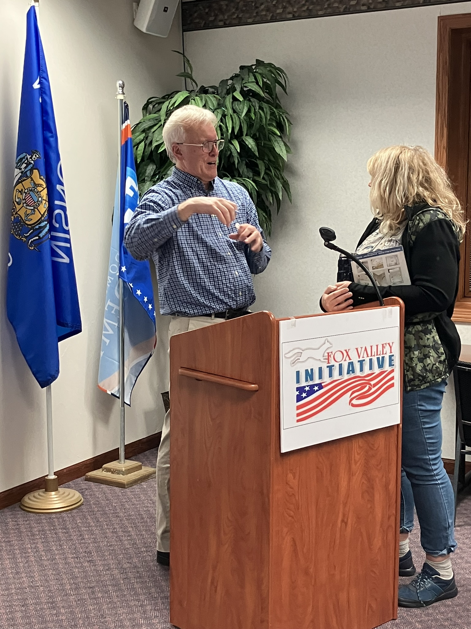 John Pudner, president of Take Back Our Republic Action Fund, chatted with guests after the November 6, 2023 meeting of Fox Valley Initiative in Appleton, Wisconsin.