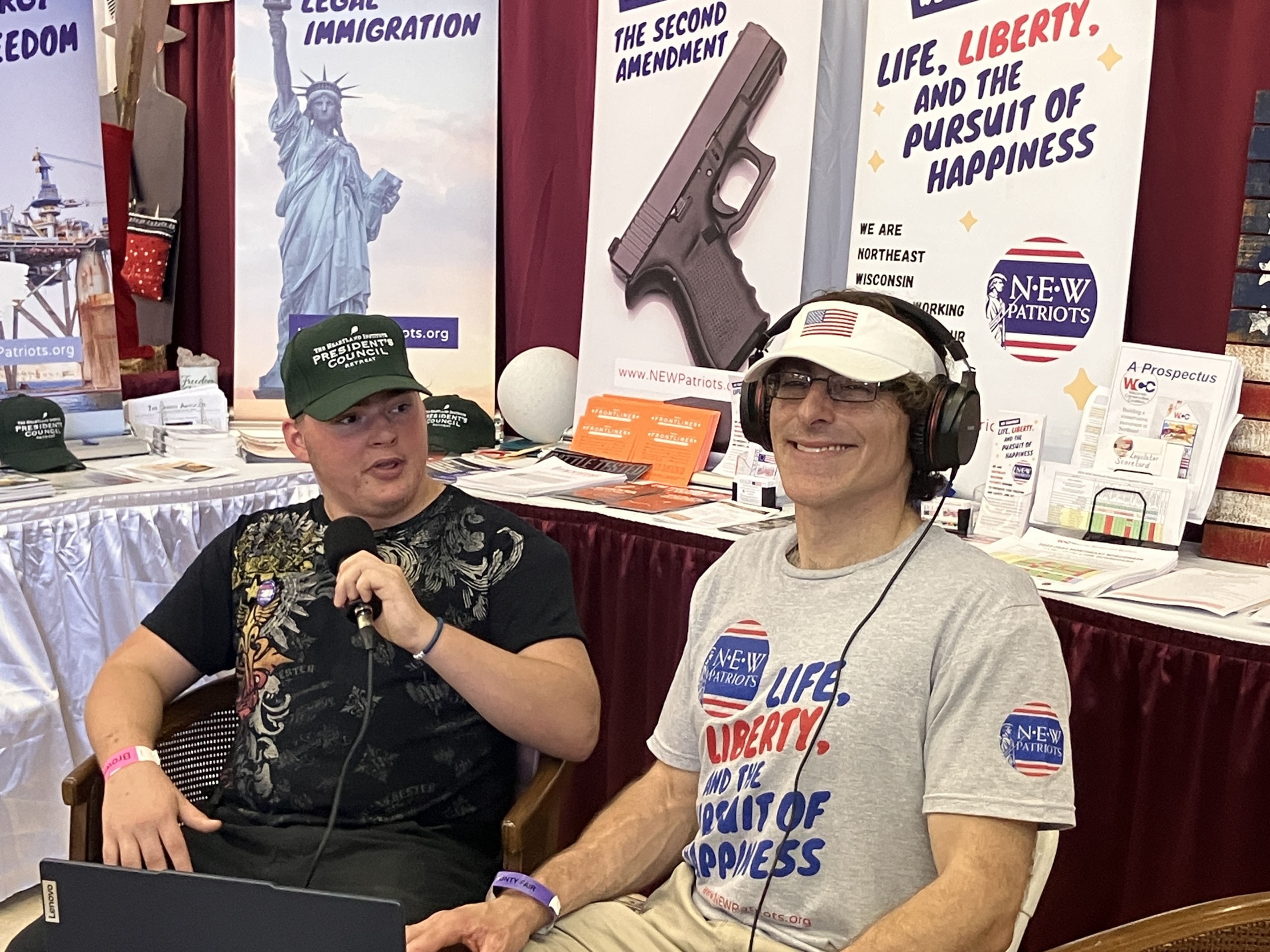 NEW Patriots booth guest Josh takes the mic from videographer Peter during the livestream.